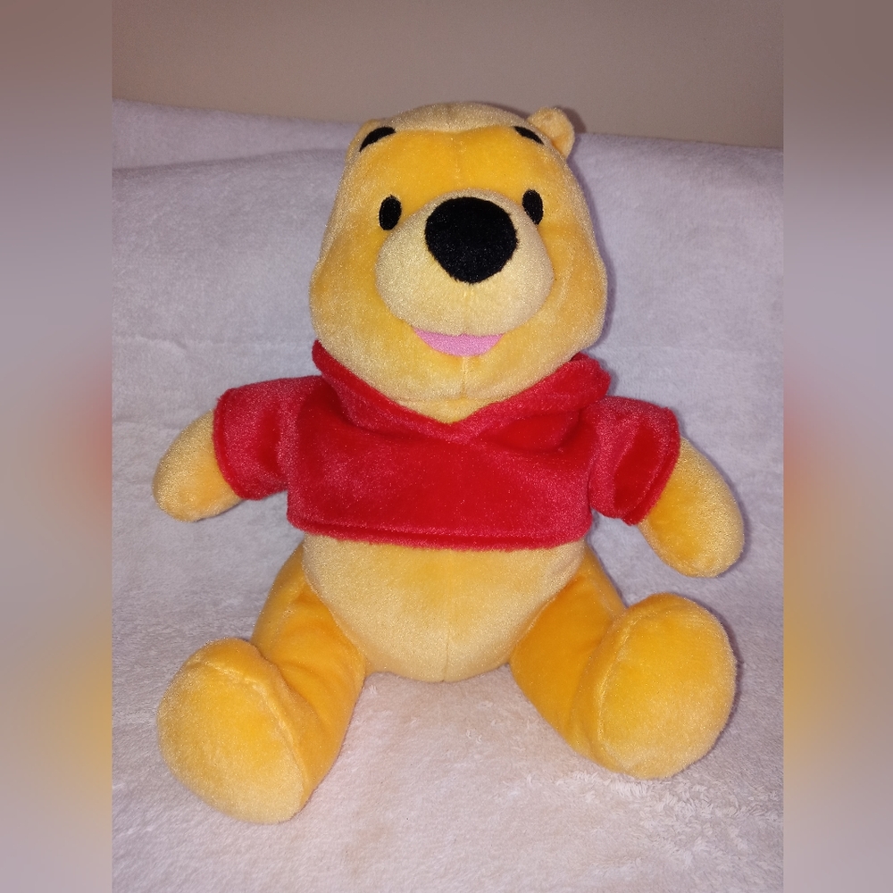 10" Plush Winnie the Pooh. Very good condition. Make an offer or bundle.